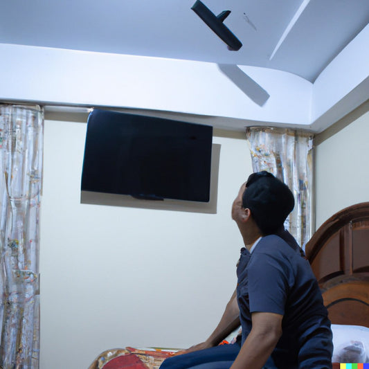 How high should a TV be mounted in bedroom?